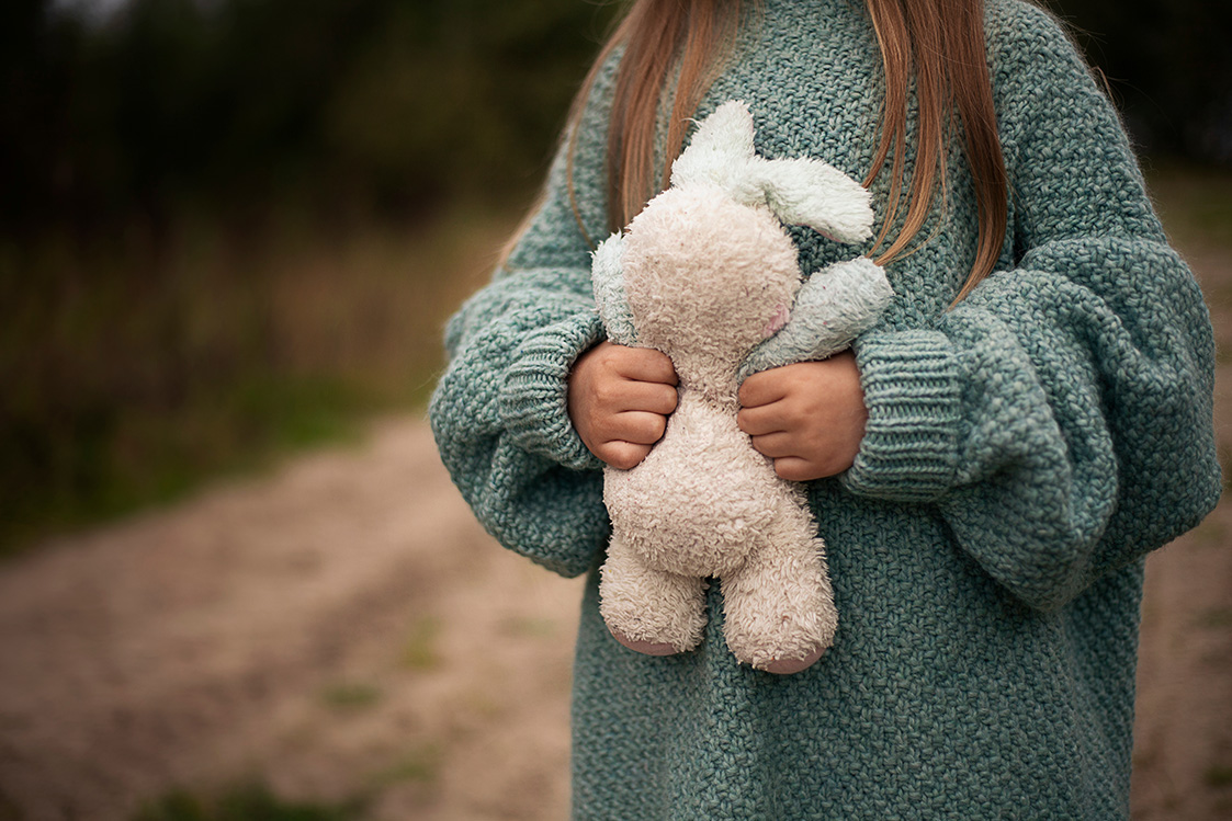 Child holding his favourite Toy