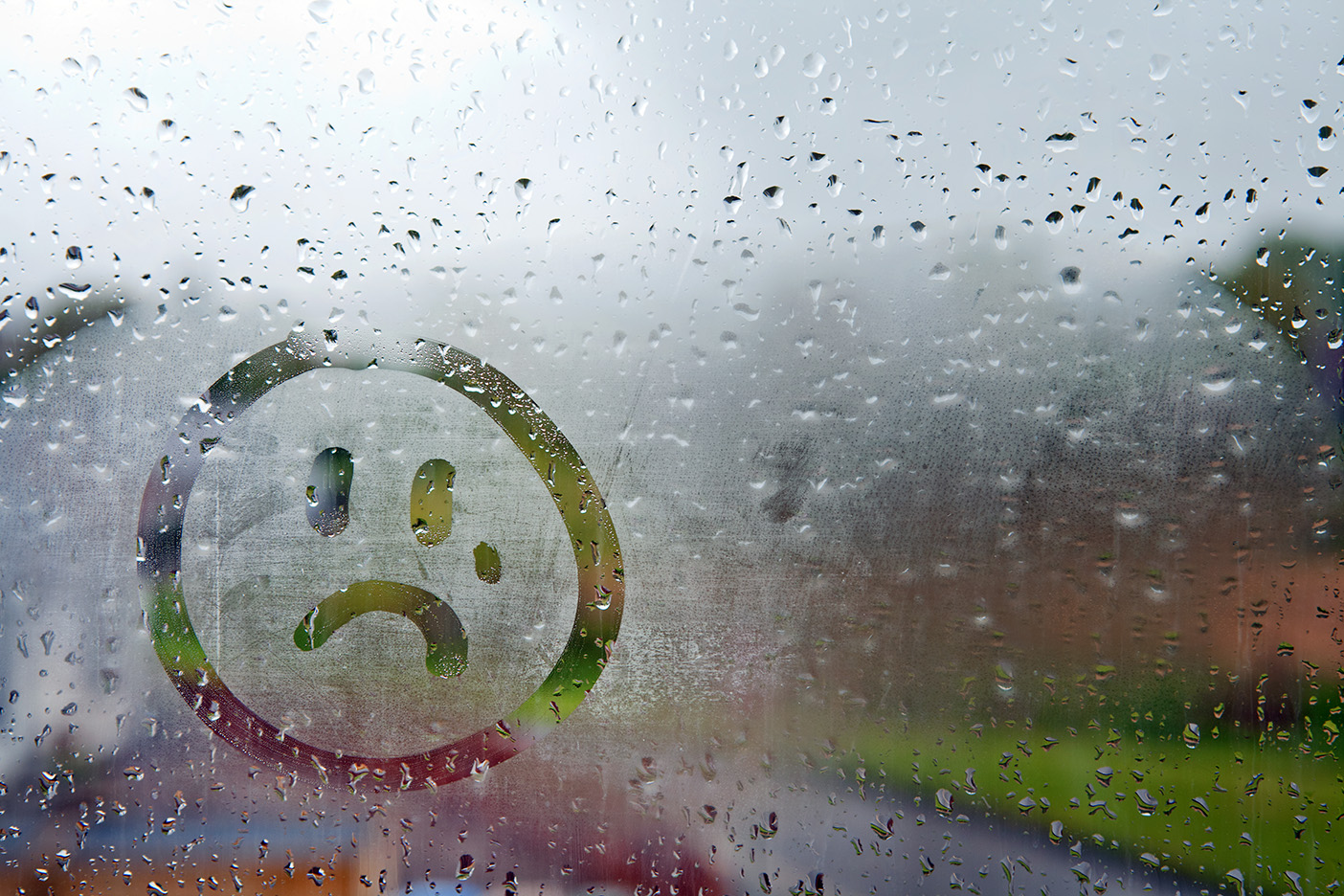 Window with frown face